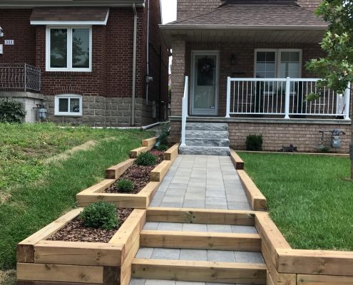 Wooden steps and garden bed.