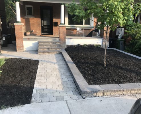 Front walkway with flowerbed