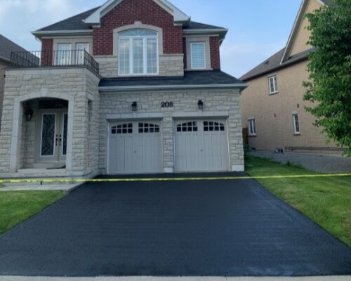 Image depicts driveway sealing by AHS.