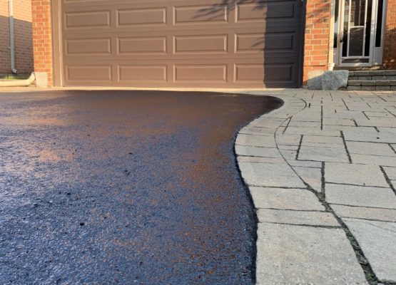 Image depicts a sealed residential driveway.