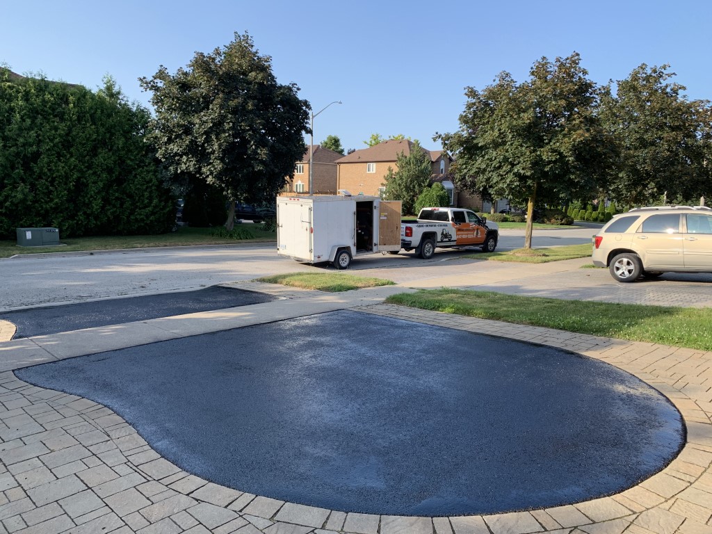 Residential driveway that has been sealed.