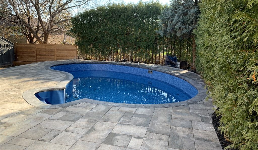 backyard pool with new interlocking