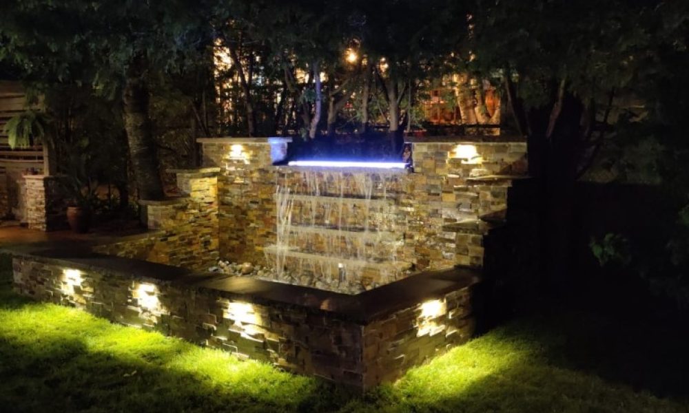 Image shows a stone waterfall designed by AHS