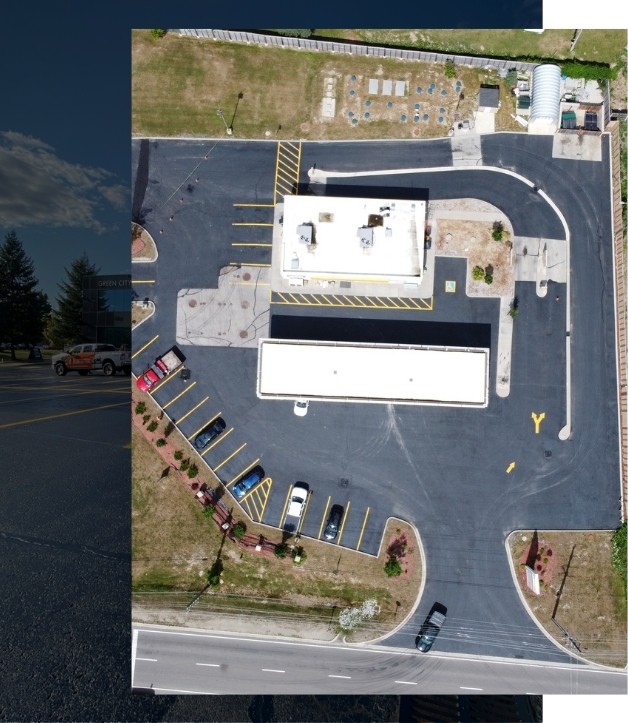 Image depicts a gas station with asphalt that has been recently sealed by the commercial asphalt sealing professionals from Action Home Services.