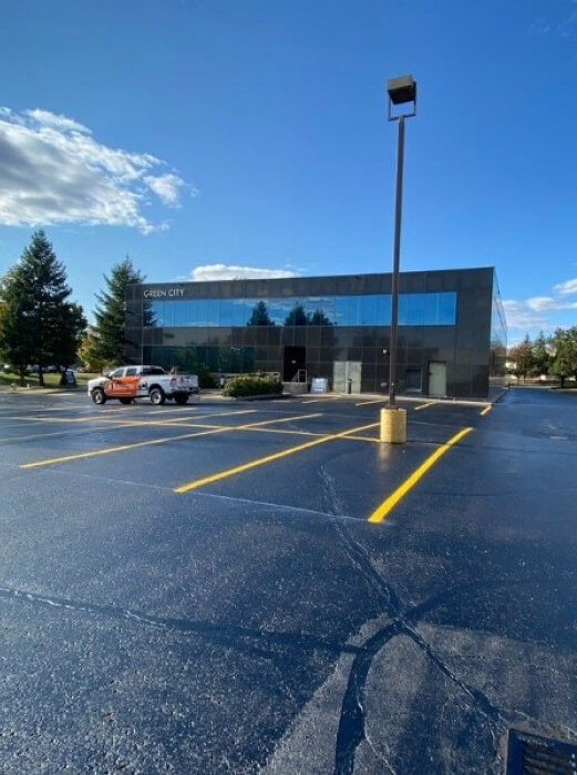 Commercial Parking Lot with asphalt sealing performed by AHS