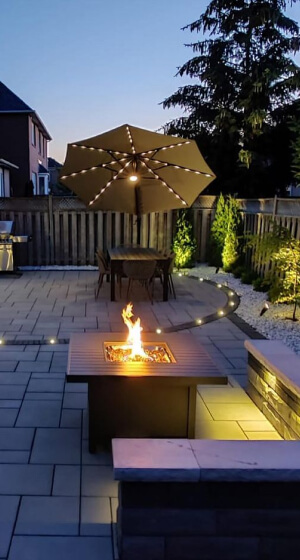 Interlocking stone patio in a Toronto backyard
