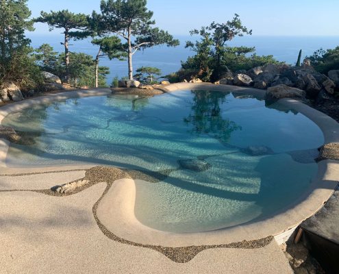 view of completed bio pool overlooking sea