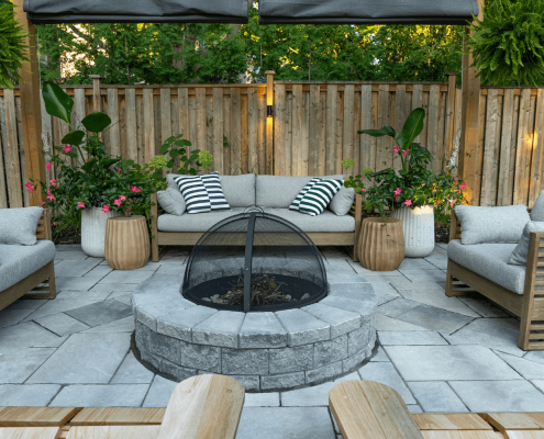 beautiful rustic firepit in backyard toronto