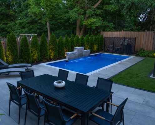 landscaped backyard with pool