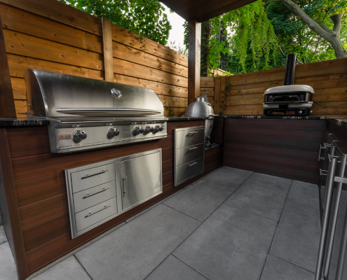 outdoor kitchen with lounging area installation