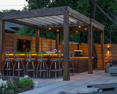 outdoor kitchen with stunning lounging area and interlocking