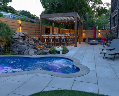 rock waterfall feature luxury backyard