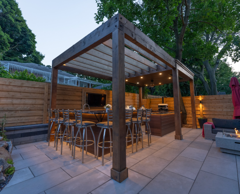 stunning backyard patio and kitchen area