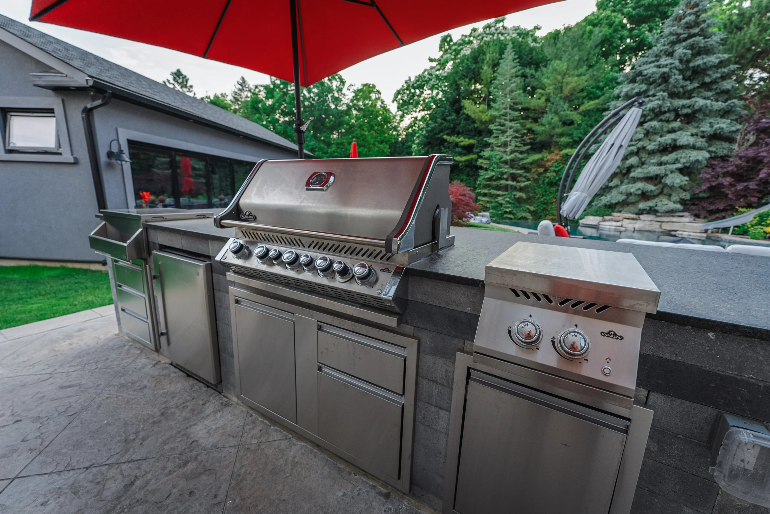 landscaping design with new outdoor kitchen