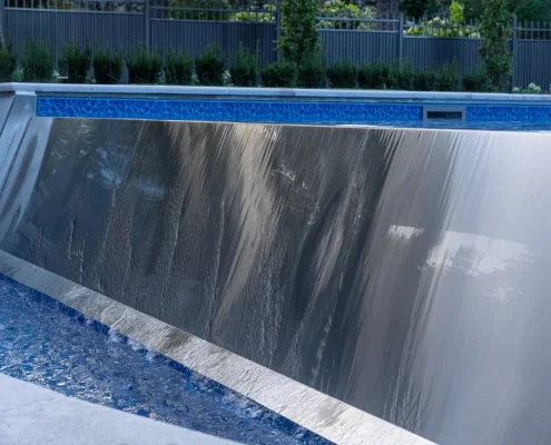 custom pool waterfall and lighting