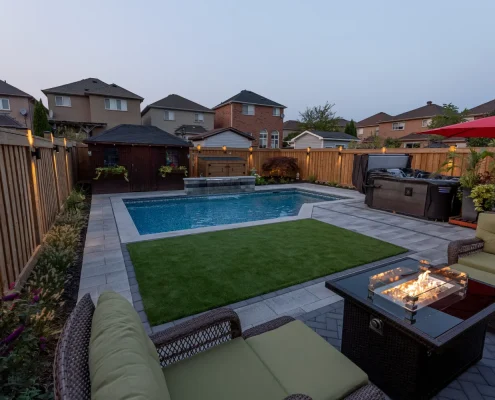 fun backyard redesign with pool and fireplace