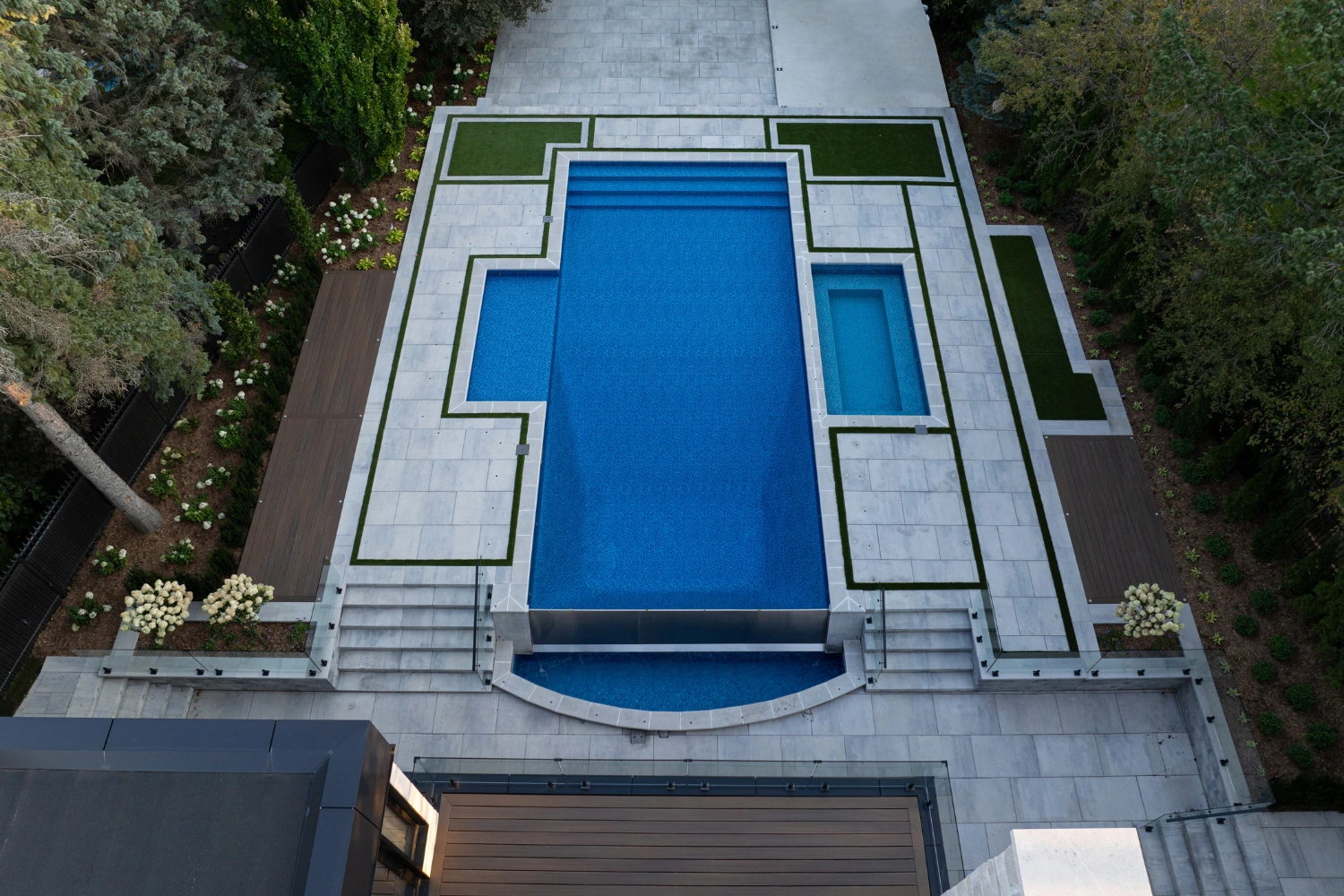 infinity pool installation with interlocking stone